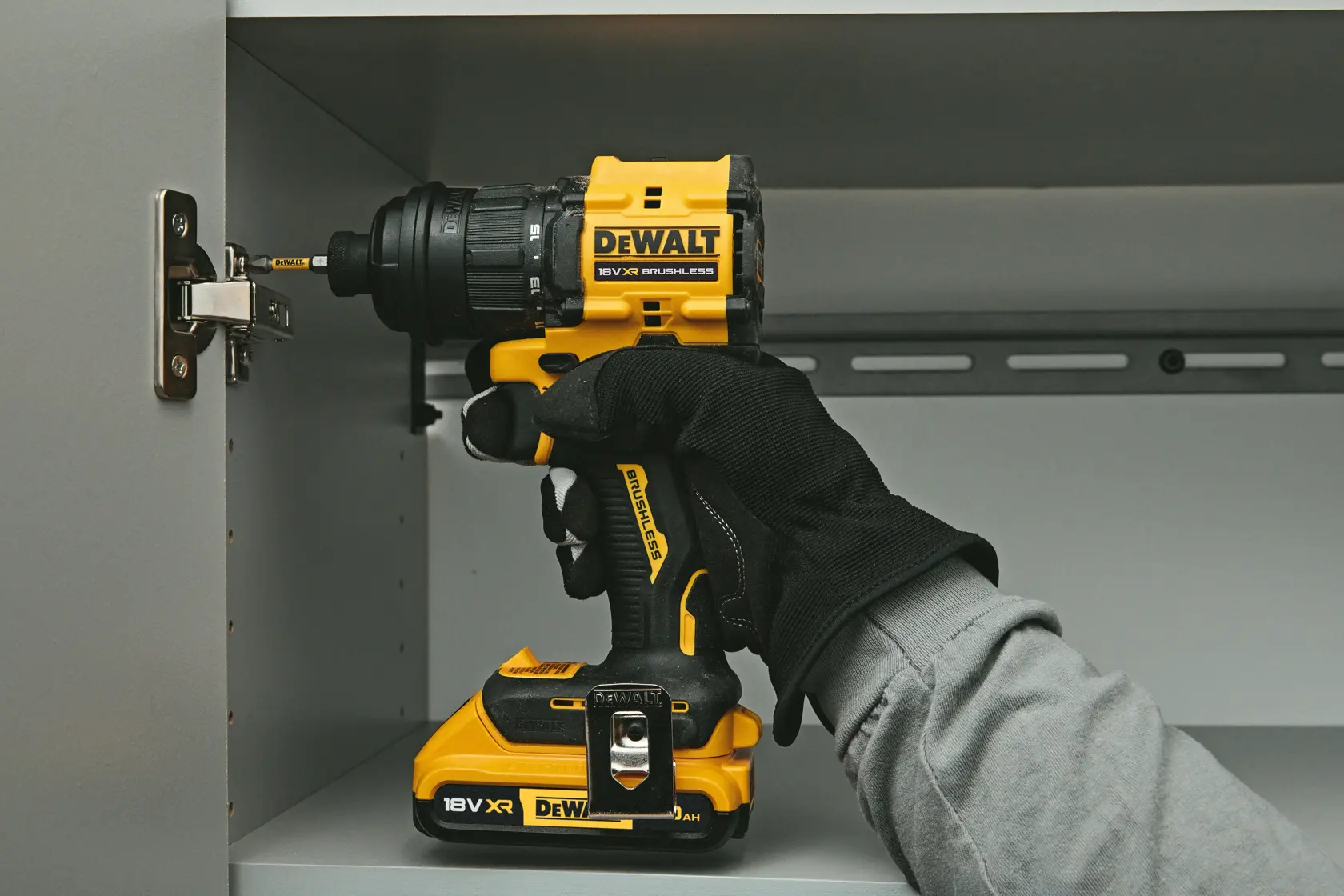 DEWALT drill DCD803NT-XJ, DCD803NT used on cabinet. Photography product.
