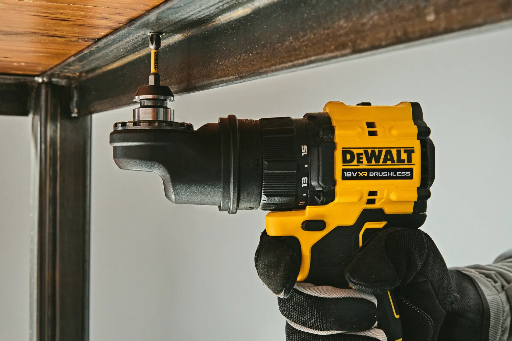 DEWALT drill used under metal, models DCD803NT-XJ and DCD803NT. Product category: Photography.