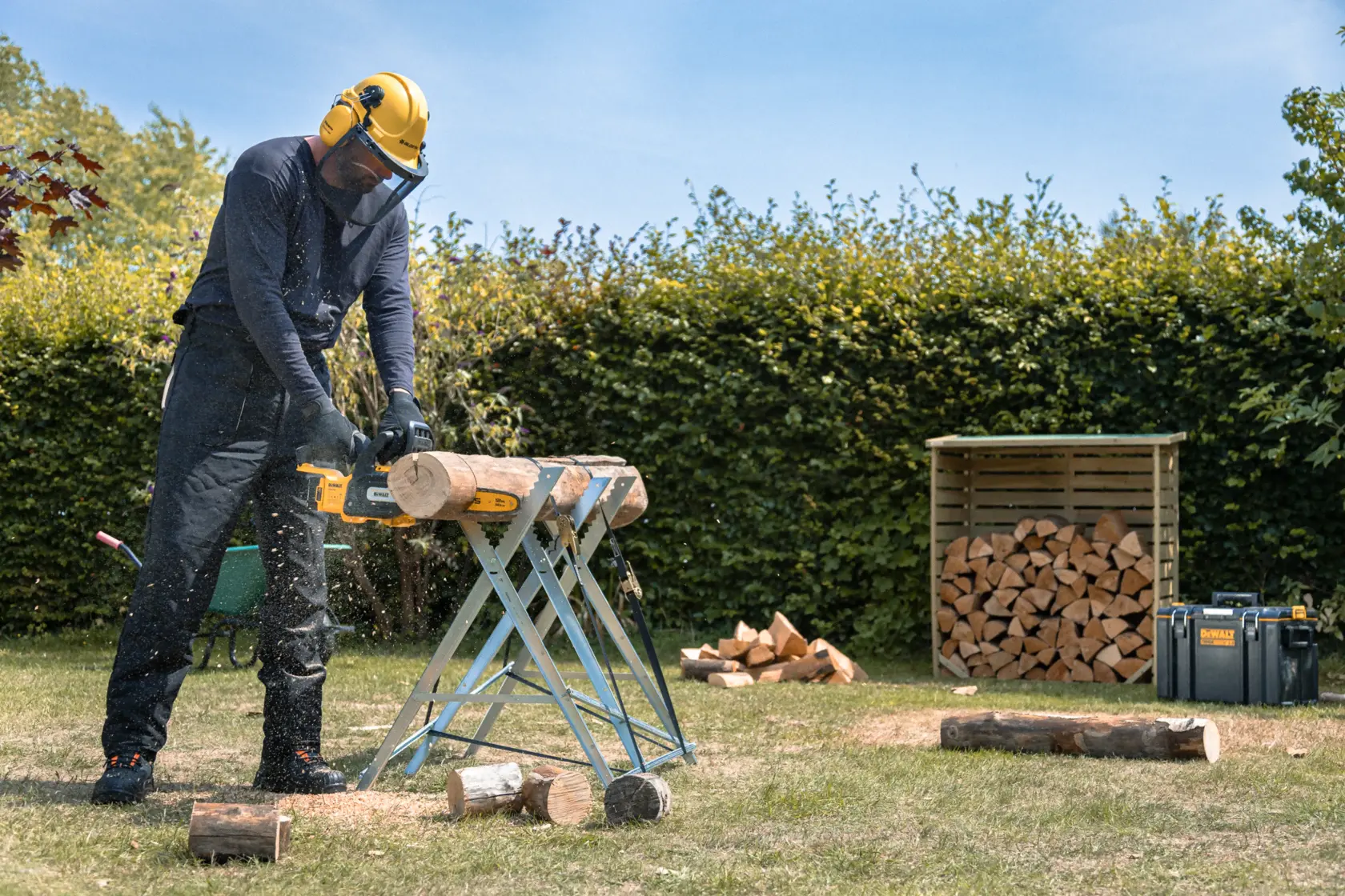 DEWALT chainsaw use outdoors. SKUs: DCMCS565P1-QW, DCMCS565N, DCMCS565P1, DCMCS565N-XJ. Photography category.