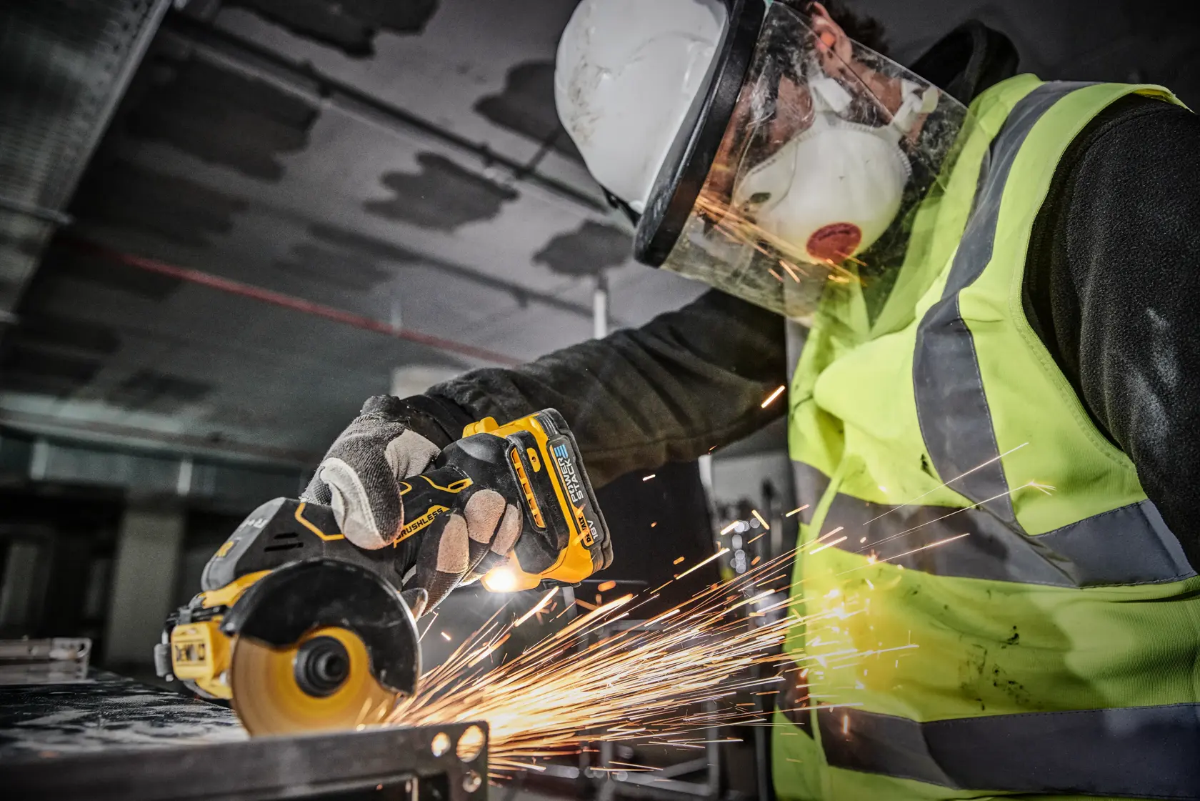 DEWALT DCS438E2T 18V Brushless XR Powerstack cordless cut-off tool, shown with key features highlighted: works in both forward and backward cutting directions, compatible with a dust extraction system, integrated LED lamp, and extreme power.